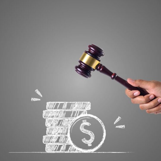 hand-that-holds-hammer-piles-money-written-with-white-chalk-draw-concept-960×540